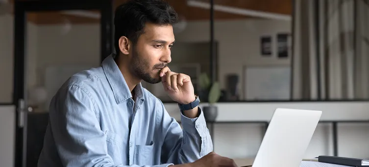 A worker suffering an injury at work, highlighting common workplace injury causes covered under workers' compensation.