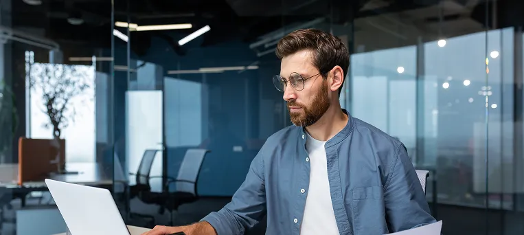 Attorney reviewing legal documents related to workplace injury claim showing how workers compensation lawyers in California assist injured employees.