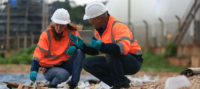 Safety investigators reviewing evidence at a worksite, showing when a third party personal injury claim may apply after an accident.