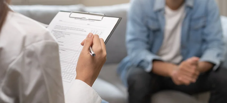 Client consulting legal professional regarding injury claim representing services provided by personal injury attorney Los Angeles and workers compensation lawyer.