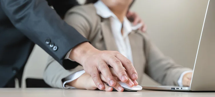Employee facing inappropriate workplace conduct highlighting employment law claims handled by sexual harassment lawyer Los Angeles and workplace harassment attorney.
